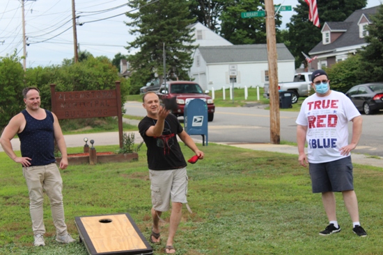 playing a corn hole game